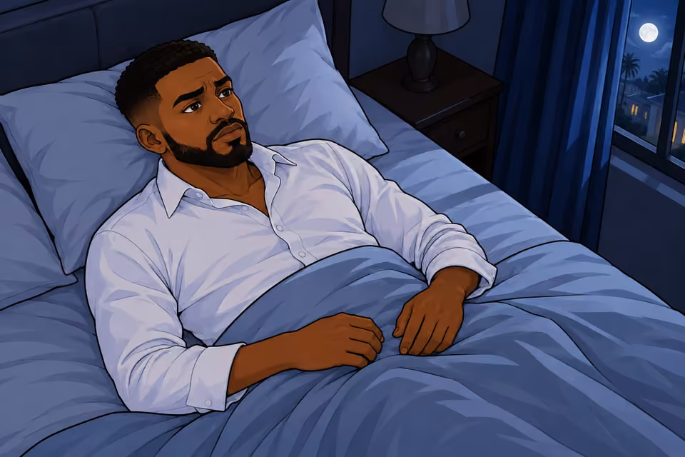 Chuka lies awake in the dark bedroom.